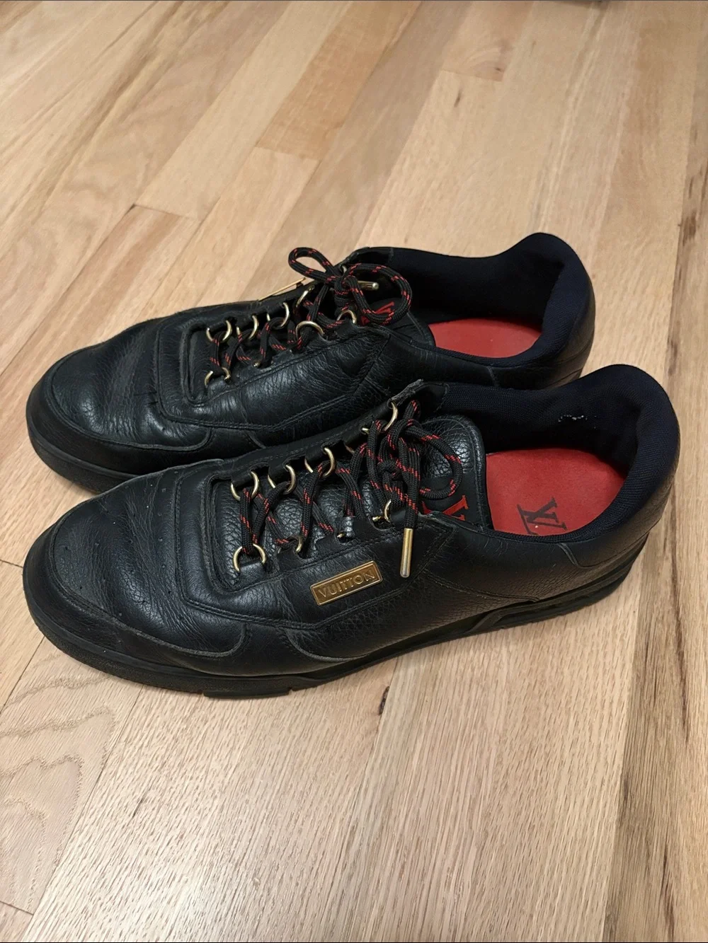 Louis Vuitton Black Leather Men's Sneakers with Red Insoles and Gold Accents